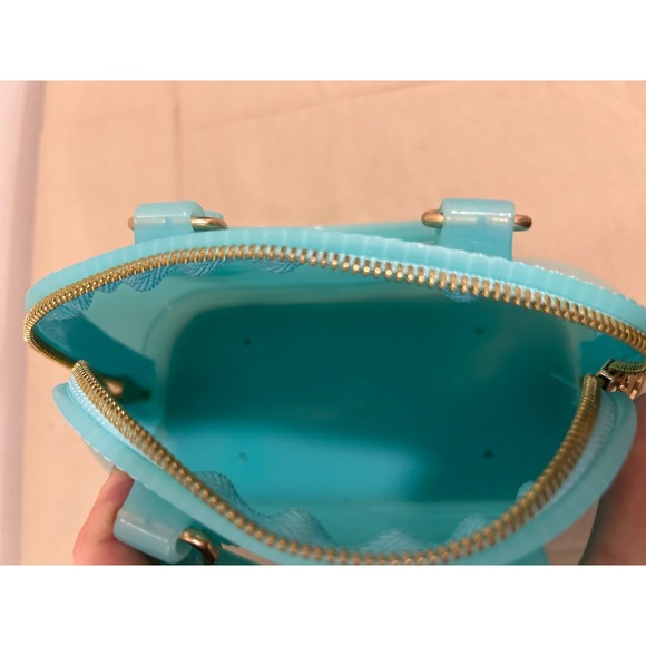 Turquoise handbag is likely a jelly-style mii purse - Picture 4 of 4